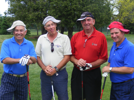 Birdies twice on Hole #5 by Randy Hughes, Jim Yundt, Tim Hawkins and Charlie Cleland offset a pair of bogeys to get the Walkerton-Kincardine foursome into red numbers with a 71 (-1) at the "Back for the Future" golf tourney.